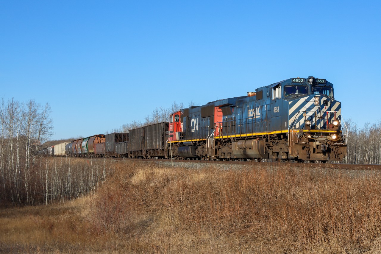 A 40251 24 approaches Lindbrook with the daily Edmonton to Saskatoon freight.  BCOL 4653, CN 5755 - 89 cars
