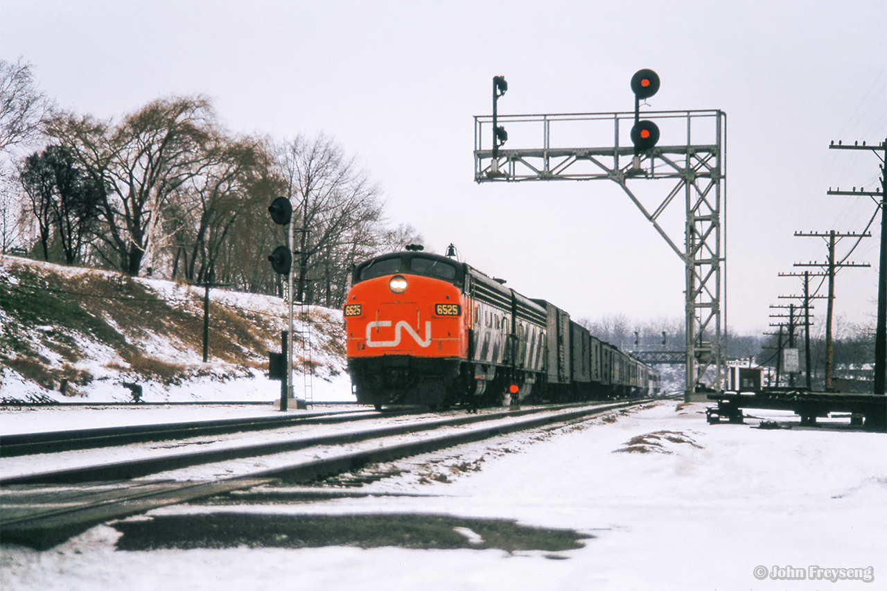 Toronto - Hamilton - London train 77 passes through Bayview Junction.

Scan and editing by Jacob Patterson.