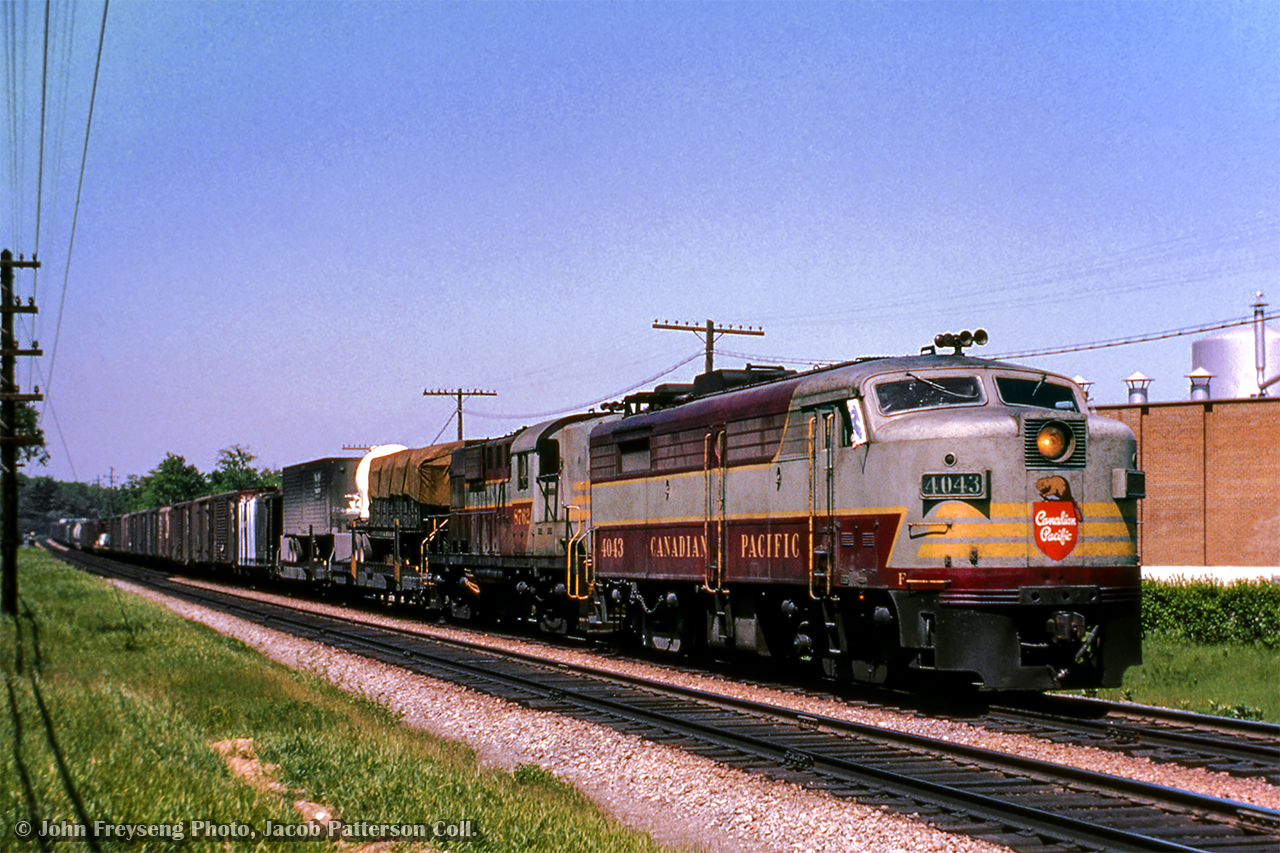 A pair of MLW products lead a westbound freight over the Don River at Wicksteed Avenue.

John Freyseng Photo, Jacob Patterson Collection Slide.
