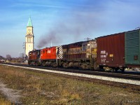 A spring evening finds three C424s eastbound along the North Toronto Sub, passing the old north Toronto station at Yonge Street.

<br><br><a href=https://www.railpictures.ca/?attachment_id=57691>Approaching the scene</a>

<br><br><i>Scan and editing by Jacob Patterson.</i>