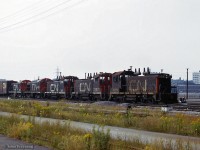 Eastbound around York street at the west end of Union Station, five switchers head up what is likely a transfer through downtown Toronto.

<br><br><i>Scan and editing by Jacob Patterson.</i>