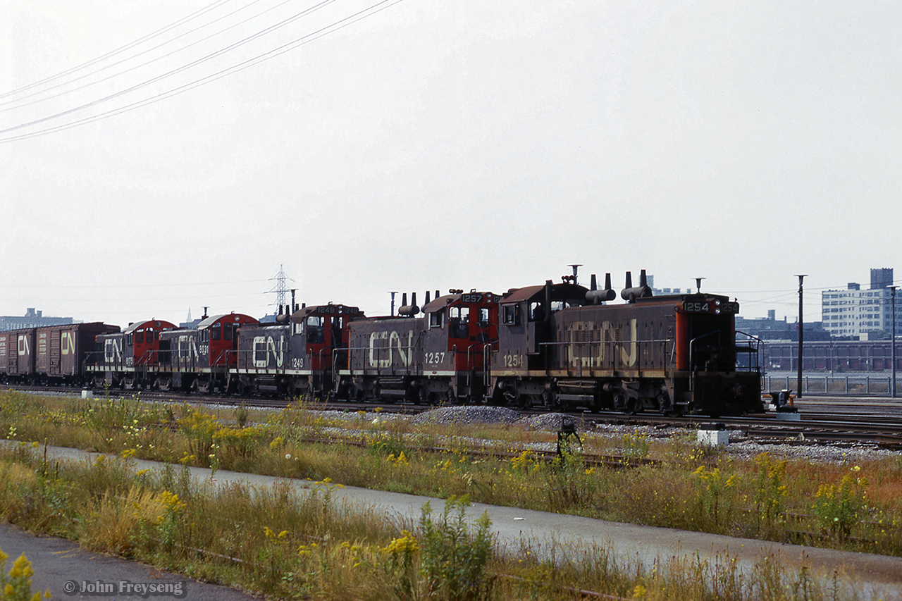 Eastbound around York street at the west end of Union Station, five switchers head up what is likely a transfer through downtown Toronto.

Scan and editing by Jacob Patterson.
