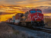 An East bound CN departure as the sun was rising over Winnipeg Manitoba.