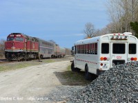 Sometimes the random train generator comes out and gives you a real surprise. CN 105 on *any* train outside the Algoma Central? Sure. A superliner too? What the heck? Waiting to depart Pine Orchard, the TEST train is about to head south, then turn east toward Montreal. Lucky for me I would follow this train for a hundred or two kilometers with a friend as we knew what was up, one of those things that might never happen again. It hasn't yet. Could it? And the busload of MOW employees preparing to deal with the 'aftermath'...