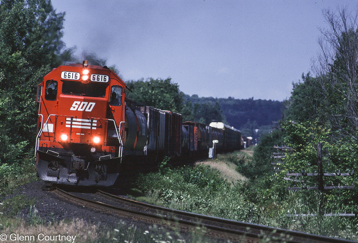Soo Line SD40-2 6614 leads train #474 south on the MacTier Subdivision. This many years later I have no idea exactly where this was taken but my slide was labelled Eady. Eady is a small settlement south of Medonte, just off Highway 400.