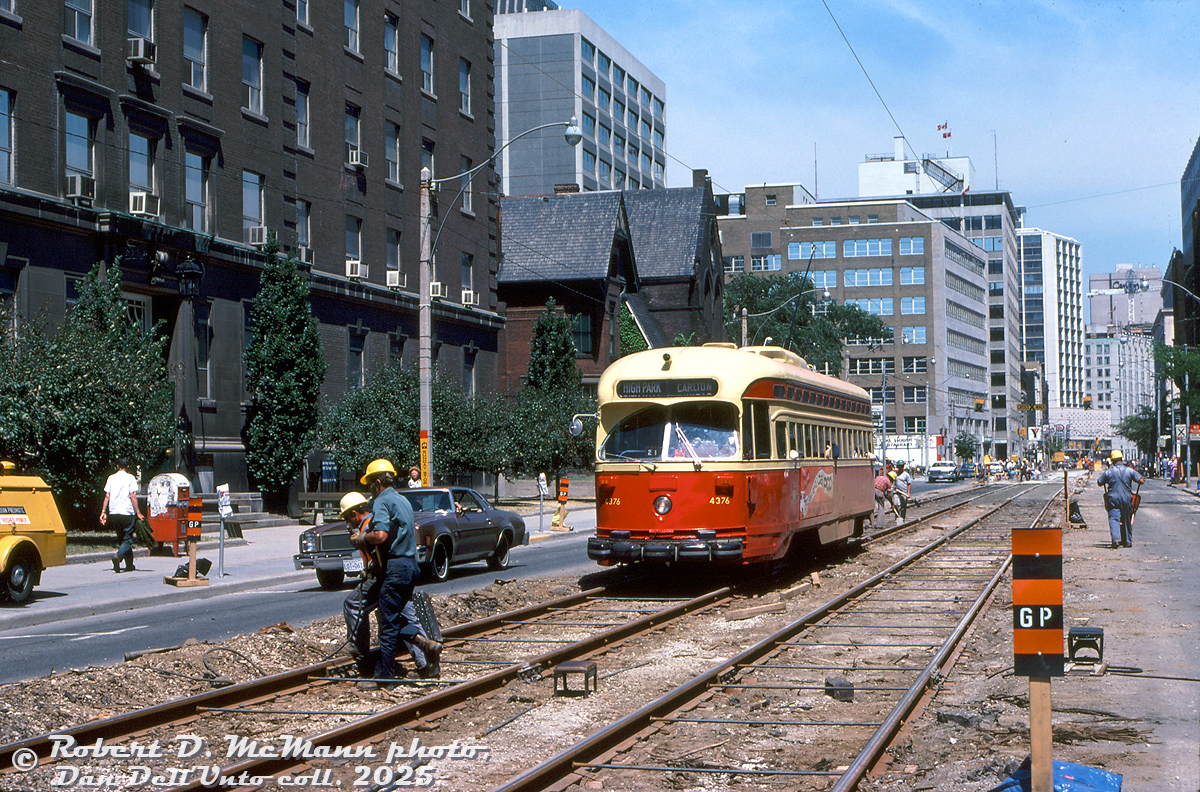 TTC PCC 4376 (A6-class, built CC&F 1947-48) heads westbound through track construction work on College Street near Elizabeth. The building on the left is the old UofT Banting Institute building, with Bay Street in the background and Yonge Street further back.

Robert D. McMann photo, Dan Dell'Unto collection slide.