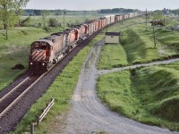 <br>
<br>
ALCO designed, MLW built, Seventies Super Power,
<br>
<br>
White Markers – no flags - CP Rail 4561, M-630 built 1969 with a MLW C-424 and a sister M-630  eastbound at the Newtonville Road overpass.
<br>
<br>
May 25, 1985 Kodachrome by S.Danko
<br>
<br>
