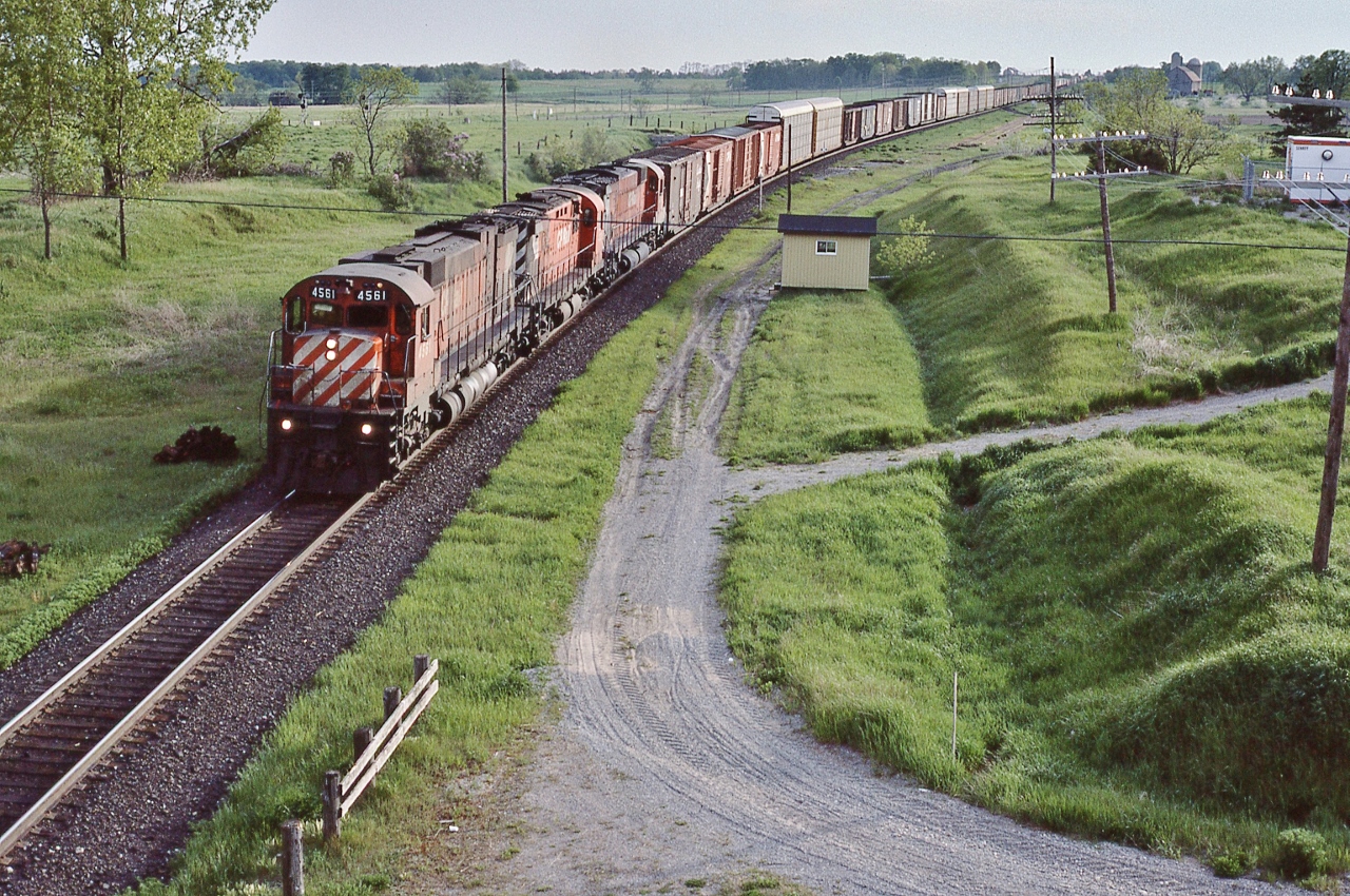 ALCO designed, MLW built, Seventies Super Power,


White Markers – no flags - CP Rail 4561, M-630 built 1969 with a MLW C-424 and a sister M-630  eastbound at the Newtonville Road overpass.


May 25, 1985 Kodachrome by S.Danko