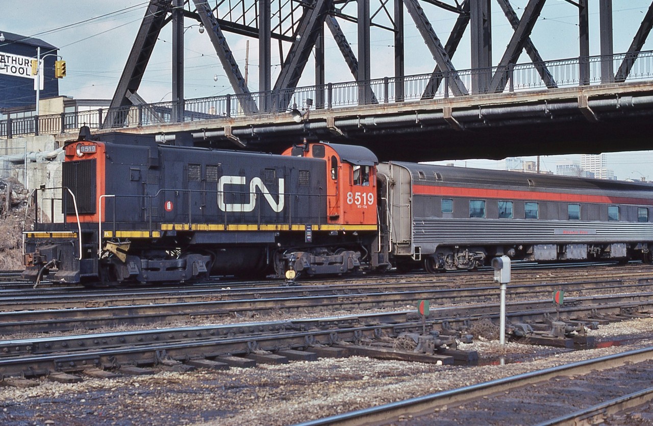 At that time, an unusual sight:  MLW 1959 built S-13 CN 8519, operated by CN handles ex CP Rail MacKenzie Manor.


At TTR Bathurst Street, March 11, 1979 Kodachrome by S.Danko


The S-13's were the exclusive power for the CN Spadina coach yard – and most common CN power for downtown CN  / TTR trackage.


Noteworthy


The initial VIA operation of the ex CP Rail The Canadian commenced October 1978, primarily out of Toronto. While the ex CN Super Continental was  Montreal based. When VIA determined the ex CP equipment would be better serviced  at Montreal, the origination of the two trains was swapped in June 1979. The ex CP Rail equipment did not return, for the most part, to the Toronto area until after the massive 1990 VIA cuts (thanks to Your Federal Government *).


 * Your Federal Government(s) killed the passenger trains - multiple times - per the “ forward planning budgets“ by  multiple Feds: the Trudeau ( Pierre brand ) 1982, then the Mulroney ( Brian brand ) government 1989 effective January 1990.


sdfourty