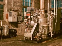 The boiler room at the E&N roundhouse in Victoria used to have two conventional boilers to provide steam to a next-door engine room (for powering shop machinery by lineshafts), as indicated by two tall smokestacks in early photos.  When CP acquired thirteen Baldwin roadswitcher units in 1948, the first five, 8000 to 8004, had one Vapor Clarkson DRK-4516 steam generator in each short hood for handling passenger trains, and when Budd RDCs took over passenger operations starting in 1955, those steam generators, possibly the first on CP, were surplus, so one was used to replace the two boilers, by then used only for shop heat.

<p>As a lone worker on graveyard shift, the pictured steam generator was my friend when it behaved, and I became well attuned to its sound repertoire, and comfortable with firing it up for dayshift on cool mornings.  In later years, an inattentive manager allowed it to run dry, and meltdown resulted, with an OK-4625 generator from an F-unit eventually brought in as a replacement.
