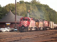 It is fairly early on this pleasant Thursday morning as you can see the train here is a bit backlit. I had been out for the parade of northbounds that usually preceded south (or east) trains first thing.  It was so nice to be able to wander without getting the negative attention of various CP employees. Thats how it worked back in those days if you made yourself known to the station agent. A friendly bunch back then.  CP 5508, B&O 3720 and CP 4508 make up the power consist here.
I might add that I have accidentally repeated some photos on railpictures over the years. Sorry!  It is hard to keep track of them all.
Cheers!!
