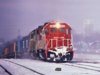  SOO SD40-2's 6613-6614 claw there way up and out of the Detroit River Tunnel with CP Train 500 from Chicago to Montreal. The train will pass the CN Windsor South (Former CR/PC/NYC) depot before turning down the Electric Yard lead towards Lakeshore and onto the CP Windsor Sub. 