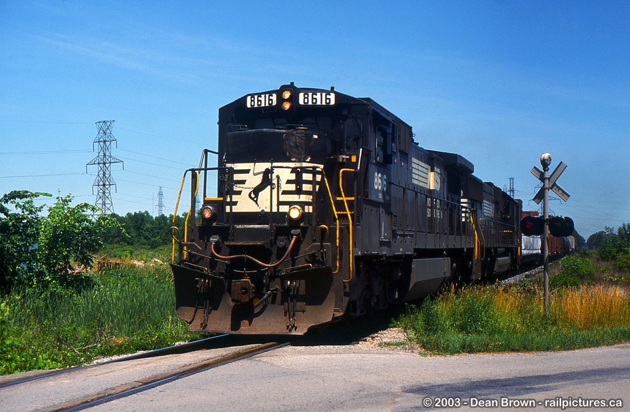 NS 445 with NS C39-8 and NS SD70 2568 heading back to Buffalo from Niagara Falls during late afternoon.