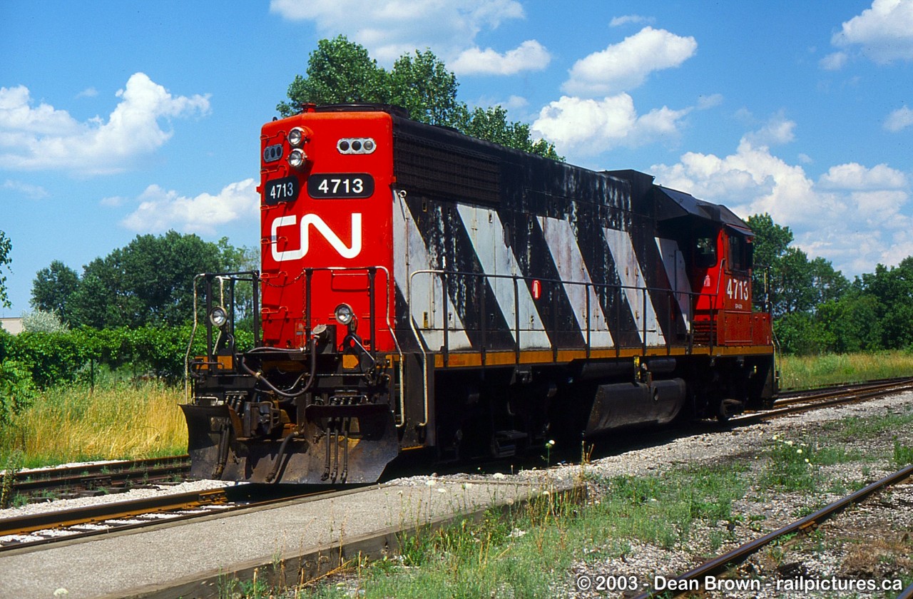 CN GP38-2 4713 parked at Niagara Falls station during mid-day.