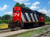 CN GP38-2 4713 parked at Niagara Falls station during mid-day.