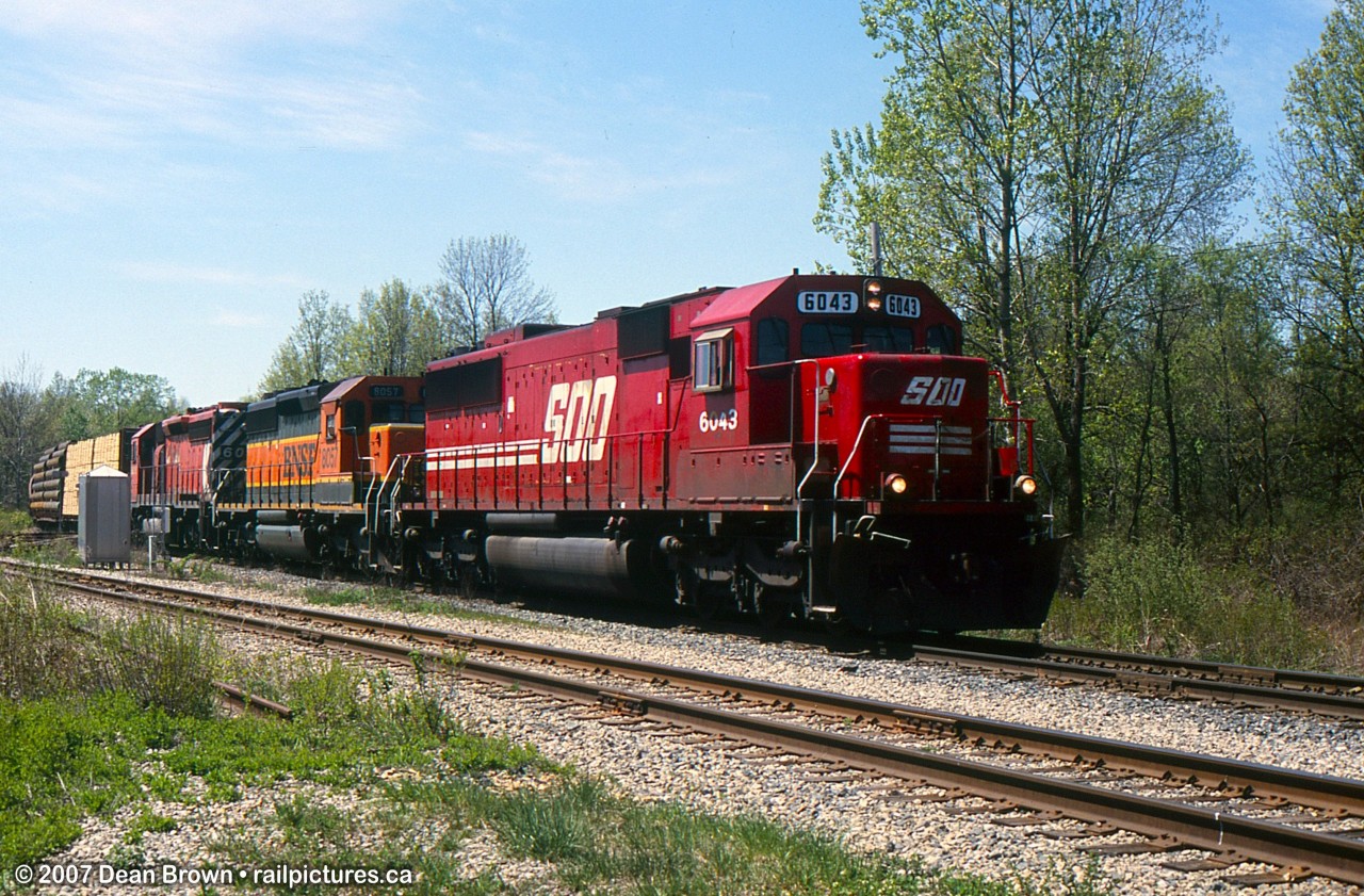 CP 426 with SOO SD60 6043, BNSF SD40-2 8057, and CP SD40-2 6016.