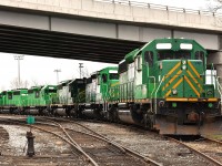 Sitting just to the northwest of the ONR's main shop complex, and under the Hwy 11B overpass were five former New Brunswick Southern GP40-2s. Apparently they had been sold to KKIX for scrapping. My assumption is they are going to be scrapped in North Bay. ( a stop there in Sept showed no sign of them) The units are KKIX 3003, 3000, 3001, 3002 and 3004. On the NBSR they toiled as 8144, 6315, 6319, 6340 and 8145.
Perhaps someone who frequents the area can confirm if they are now scrapped (maybe in the process of..) or are way back in the yard, which is congested to the point it is hard to spot anything, even from up on the highway bridge.