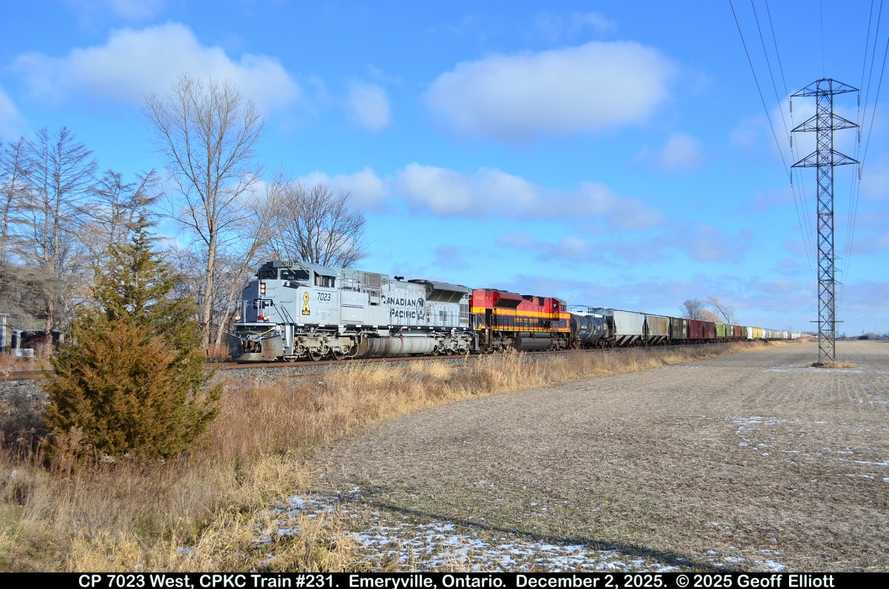 A big Thank You to Brady Butler for the heads up that train CPKC 231 was nearing Tilbury earlier today.  I was able to get out and even dodge the clouds to get this sunny shot of CP SD70ACu #7023 leading KCS SD70ACe #4102 on this very long 231 Train.