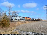 A big Thank You to Brady Butler for the heads up that train CPKC 231 was nearing Tilbury earlier today.  I was able to get out and even dodge the clouds to get this sunny shot of CP SD70ACu #7023 leading KCS SD70ACe #4102 on this very long 231 Train.