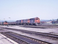 CN train 308 is ready to head east out of Capreol on the Alderdale Sub.  It will be running as regularly scheduled timetable train 894.  The ore cars on the head end will be set off at the little mine located at Skead. Good power this day in the form of GP40 4008 and M636s 2320 and 2336.