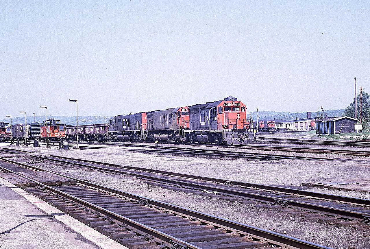 CN train 308 is ready to head east out of Capreol on the Alderdale Sub.  It will be running as regularly scheduled timetable train 894.  The ore cars on the head end will be set off at the little mine located at Skead. Good power this day in the form of GP40 4008 and M636s 2320 and 2336.