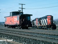 CN train 555 with GP9RM’s 4143 and 4112 are pictured working the Paris pit trackage along the Dundas Subdivision. On this day they had van 79437 and would eventually depart caboose hop to Brantford after their work was completed. 