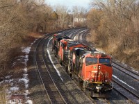 CN 126's power is heading back to Taschereau Yard after bringing cars to the Port of Montreal.