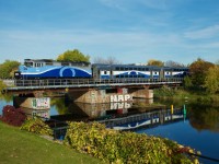 EXO 1207 has an F59PH for power as it crosses the Lachine Canal not too long after its departure from Central Station in downtown Montreal.