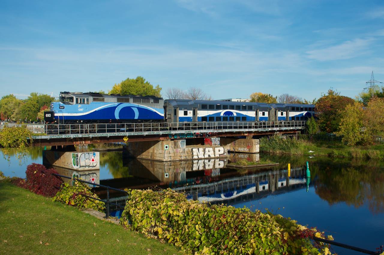 EXO 1207 has an F59PH for power as it crosses the Lachine Canal not too long after its departure from Central Station in downtown Montreal.