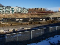 Run-through train CN 529 with NS 1805, NS 1036 & NS 4548 for power has just passed Turcot Ouest.