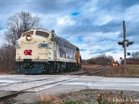 The Railway City is serenaded with a set of air horns from both short line visitors. OSR 1401 navigates the curve in the "Wabash Transfer" while GIO "2003 West" approaches the diamond on the Cayuga. 