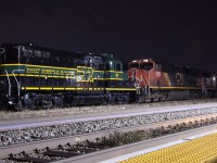 After completing a setoff, A43431 21 awaits signals back out to their train with CN 2756, CN 5634, CN 2292, and ETL 108