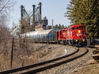 <h1>The More You Know</h1>
<p>CP 9017 takes the lead in day 1 of a multiple day CWR train on the Hamilton sub back in March of this year. Everything on the railway is a gamble, as I was operating on a hunch that the train was going to run on this day, but I took it as it would of been my first time seeing a Canadian Pacific barn leader</p>
<p>Lord and behold, I had woken up to a text that one of my buddies was on the train, and the game was on. After getting held up by 3 trains before heading down the Hamilton sub (no surprise there), it slowly leans along Waterdown North after dropping rail a few hundred meters down the line where I was standing </p>
<p>But, just a few months after, I discovered that there is a station (now used as an office) behind where the lead units are in the frame. I totally did not notice this as the trees were blocking off most of the structure from me as I waited for the train to finish dumping rail</p>
<br>
<p>Click here for Steven Host's better angle of <a href="https://www.railpictures.ca/upload/hidden-in-plain-sight-heres-one-for-the-station-guysa-photo-that-took-some-planning-and-time-to-execute-when-i-saw-arnold-mooneys-photo-of-waterdown-north-in-1980-i-looked-on-the-map-and-s" target="_blank">the station</a> with a northbound train </p>
