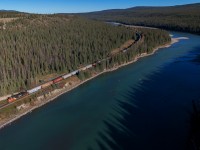 Having joined the Athabasca River at Entrance, M 31151 13 will follow the river into Jasper before heading west towards Yellowhead Pass, while the river veers southward towards Athabasca Falls on the Ice Field Parkway.  CN M 31151 13 : CN 2256, CN 2205 – DP 1x1x0 – 123 cars