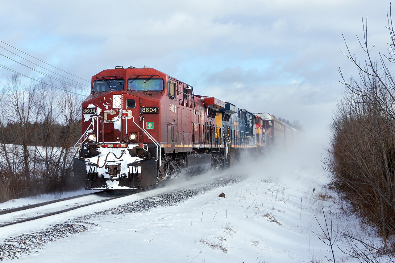 When Maverick goes railroading......sadly, no windrows. CSX 7009, KCS 4035 trail.
