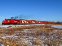 With the show in Camrose over, the Holiday Train throttles up after meeting an eastbound at Ervick on the Wetaskiwin Sub. Next stop is Wetaskiwin on their way to Red Deer.