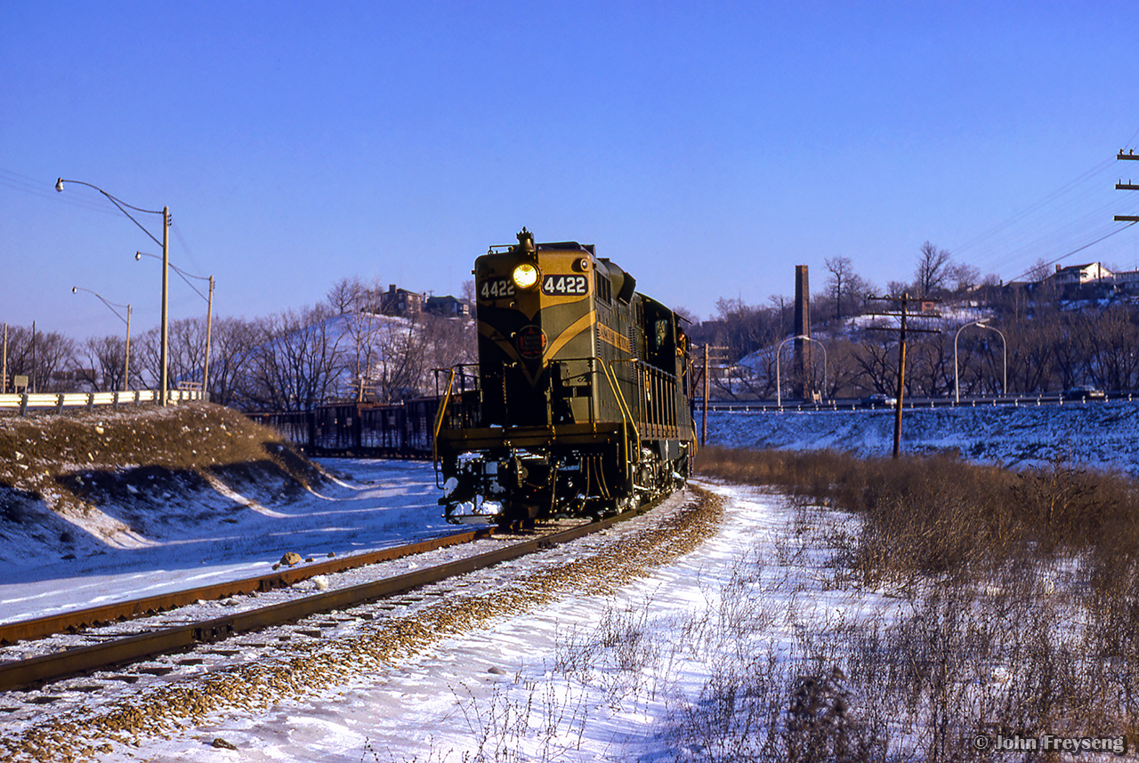 Rounding the curve north of Rosedale siding, Capreol - Mimico train 310 nears the end of its journey, passing through the Don Valley.  After clearing into the siding, CNR 6218 will depart northbound on a UCRS excursion touring the new Toronto bypass route, travelling Union Station - Doncaster - Brampton - Burlington - Oakville - Union.

Scan and editing by Jacob Patterson.
