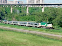 GO 710 leads its train southbound along the Bala Sub at Millwood Road.  Note the spur off to the North Toronto Wastewater Treatment Plant.  APCU 907 brings up the rear.

<br><br><i>Scan and editing by Jacob Patterson.</i>