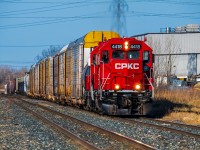 One of the final nice fall days in Southern Manitoba. The crew is rolling through the St. Boniface neighborhood on their way to their daily Paddington yard job.