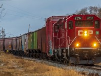 Switching come cars  in the St. James neighborhood as the snow begins to fall.