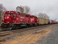 Rumbling through the neighbourhood of St. Boniface, CP 4433 leads the way back to the CPKC Higgins yard after their daily Paddington Yard job.