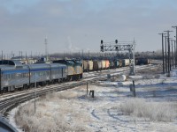 <b> Skirting the yard >/b> <br>
VIA 6458 and VIA 6449 lead VIA 2 The Canadian around CN's Saskatoon Yard on November 30, 2025. <br>
Once it passes CN Chappell Jct. at the east end of the yard, VIA 2 will make a reverse move on to the station track where a full train servicing will take place. <br>
Passengers will have 30-45 minutes to detrain for some fresh air and a walk along the station platform.