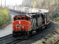 Just north of Capreaol, super-hot 215 starts its next leg on its run from Toronto to Winnipeg. An SD40 trails. It's shots like this that make me wish I'd spent a lot more free time trackside for the 18 months I lived in Sudbury.