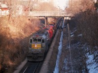 The unusual combination of QNSL 209, CP "Empress" 8921 and TH&B 77 has just brought in the evening 'Starlite' from Toronto and this view is of the power after it dropped its train. The van was dropped after power wyed and then it was off to refuel at Chatham St facilities, with QNSL now on the lead for return to Toronto. TH&B 77 was left behind. 
