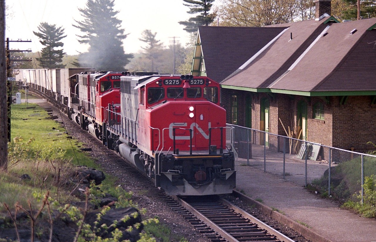 Its early morning and CN 5275, 9571 and 9621 are heading north by the old CN Parry Sound station. The directional running setup between CN & CP is still a few years away.  All trains here now are south bounds.
