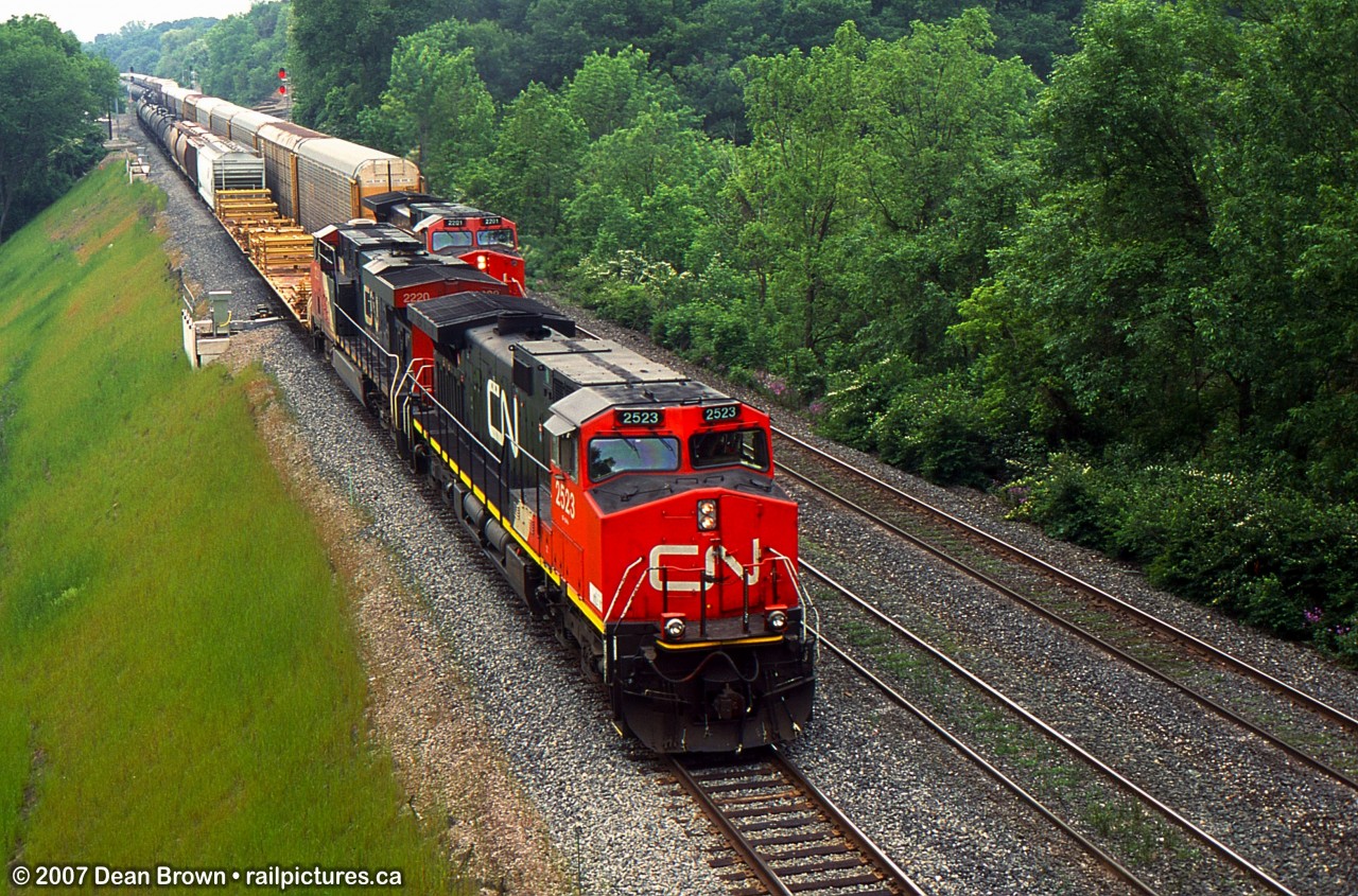 422 with CN C44-9WL 2523 and CN ES44DC 2200 were stopped at Bayview on track 3, and CN 332 with CN ES44DC 2200 was on track 2 running beside 422.