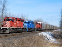  A trio of SD40-2's CP5988-CEFX3184-CP5932 leads train No 421 through Guelph Jct on a sunny March 4th 2010. In a few moments the train will leave two track CTC and enter the single track OCS/ABS territory. 