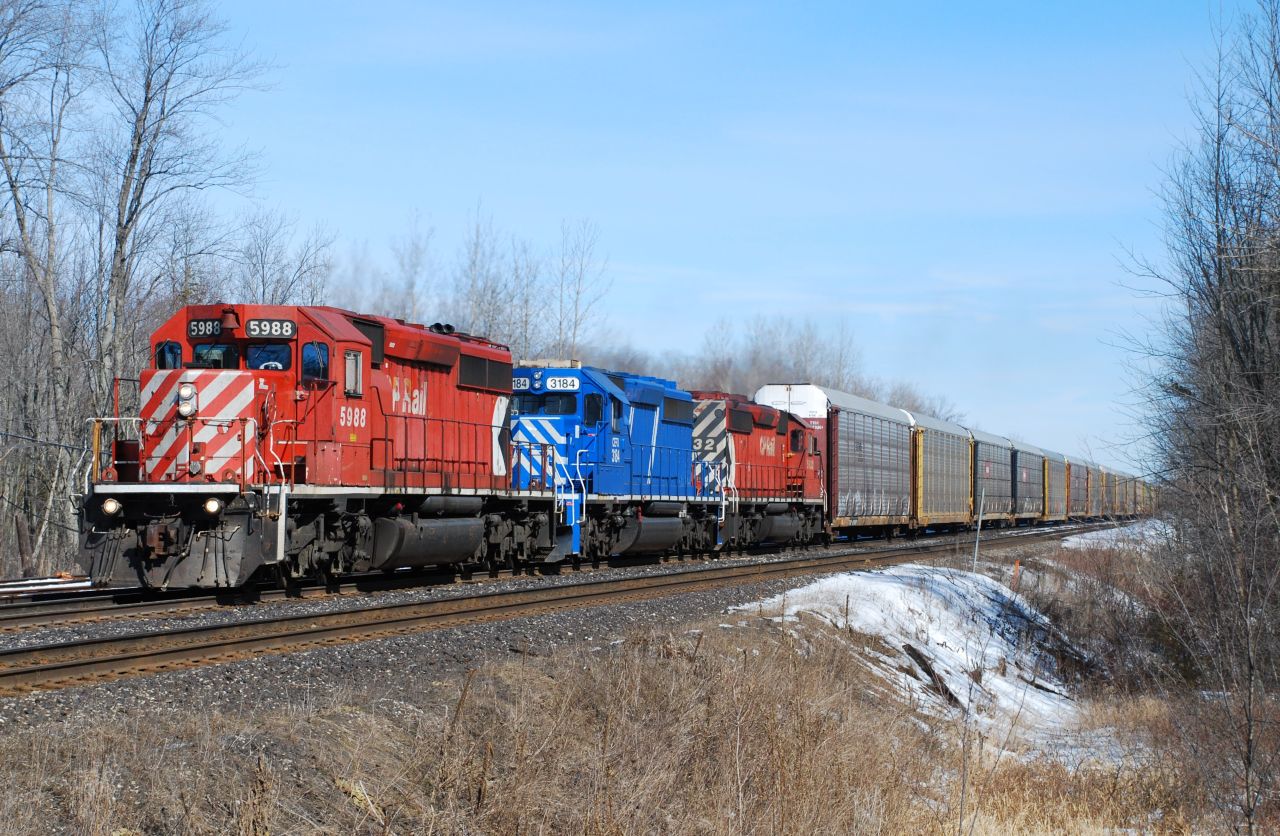 A trio of SD40-2's CP5988-CEFX3184-CP5932 leads train No 421 through Guelph Jct on a sunny March 4th 2010. In a few moments the train will leave two track CTC and enter the single track OCS/ABS territory.