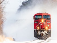 Canadian winter railroading in full swing as CP 9822 leads a late morning westbound into Trenton kicking up fresh snow along the way.