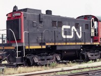 CN 8513 seen at the Toronto Union Station coach yards in August of 1983. These MLW S-13's did the daily chores of bringing Via consists down to the trainshed. The Toronto skyline is seen in the background haze.